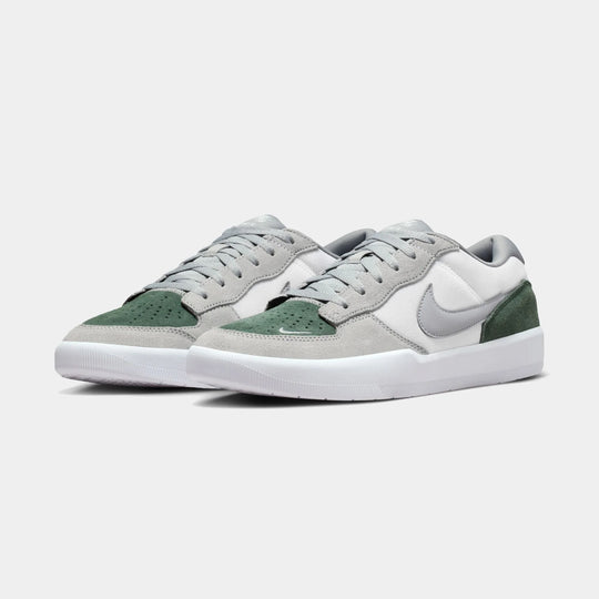 Pair of gray and green force 58 sneakers 