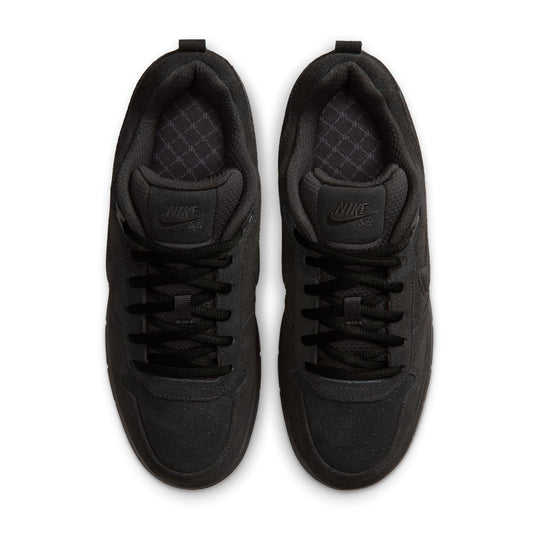 Pair of black Nike sneakers on a white background