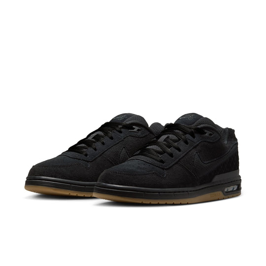 pair of black nike sb