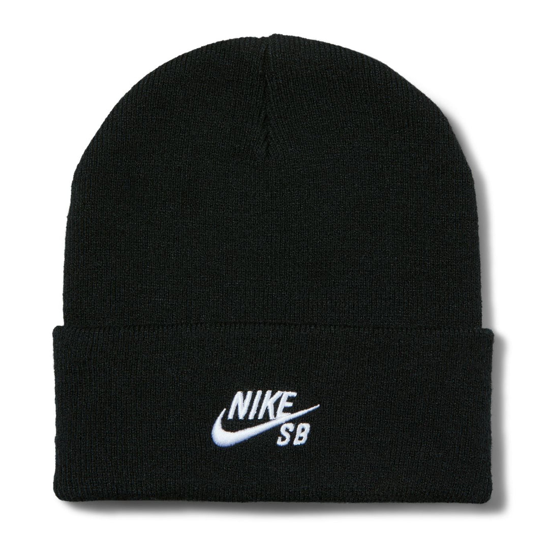 A black knit beanie hat with a white embroidered Nike SB logo on the front cuff, shown against a plain white background.