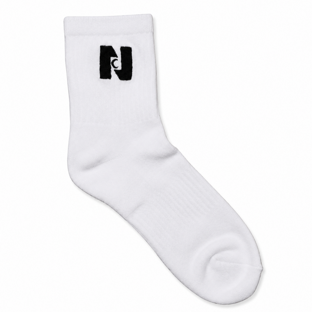 A single white crew sock with a black embroidered stylized 'N' logo on the cuff, displayed against a clean white background.