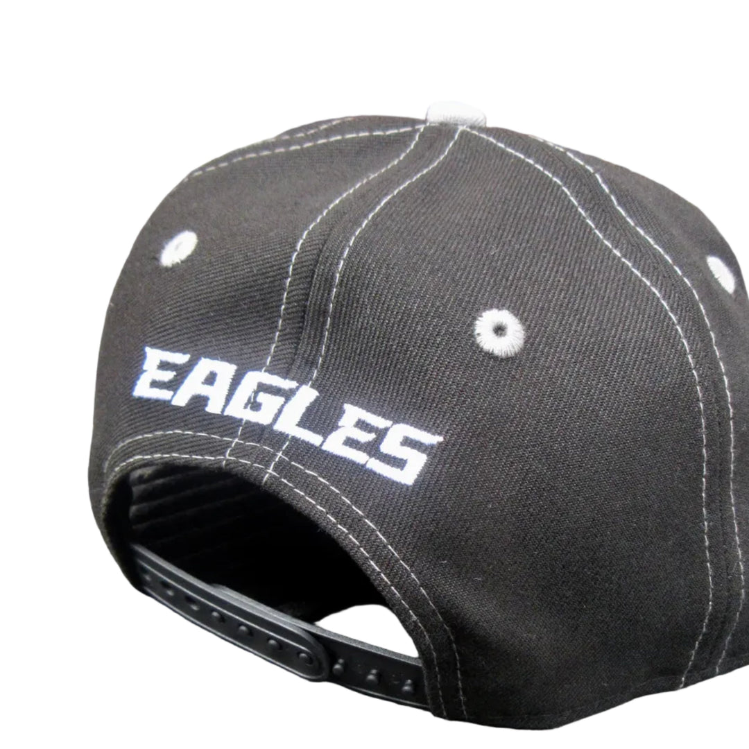 A black baseball cap with white contrast stitching and &