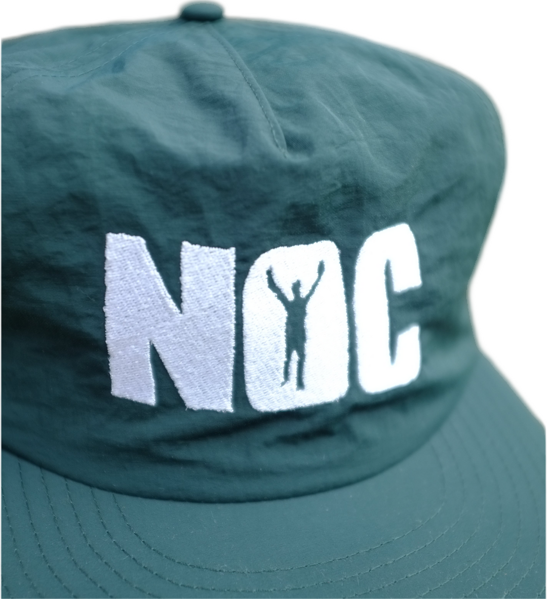 Green cap with white 'NOC' logo on a white background