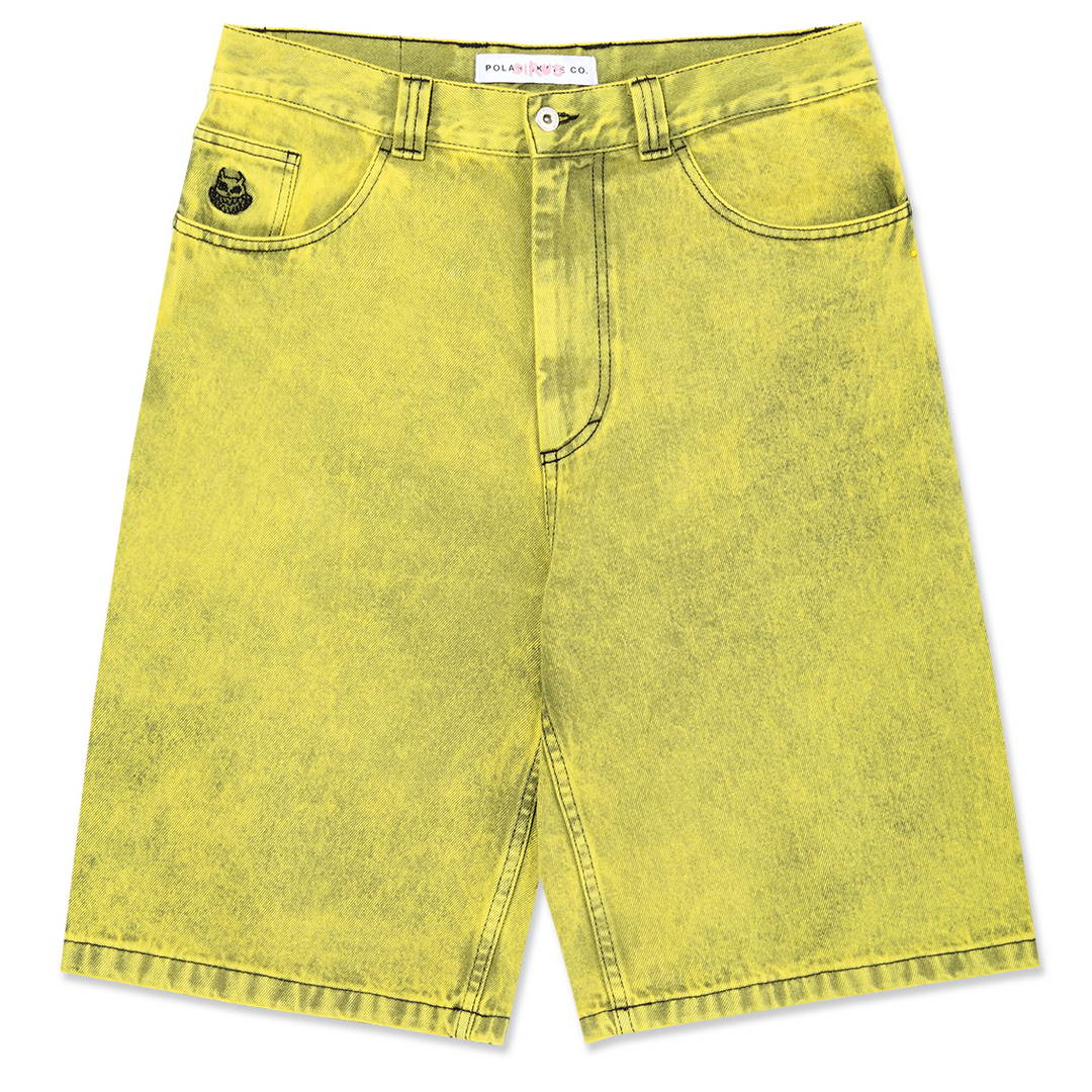Yellow denim shorts on a white background