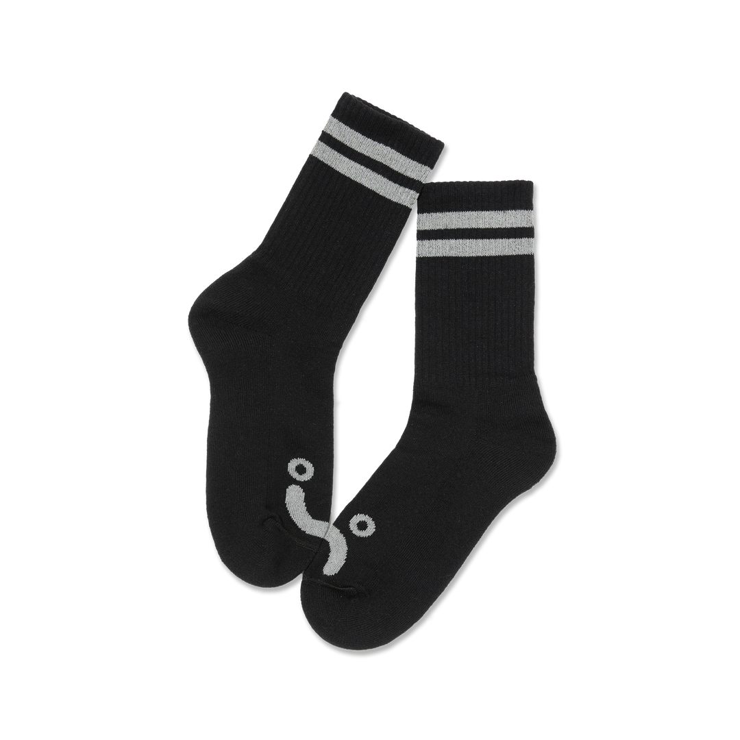 Black socks with gray stripes on a white background
