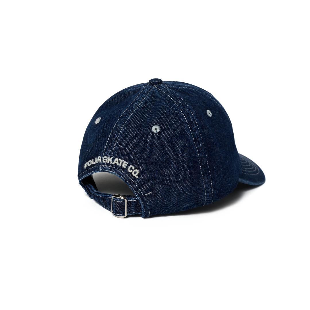 Blue denim cap with 'Four Skate Co' logo on a white background