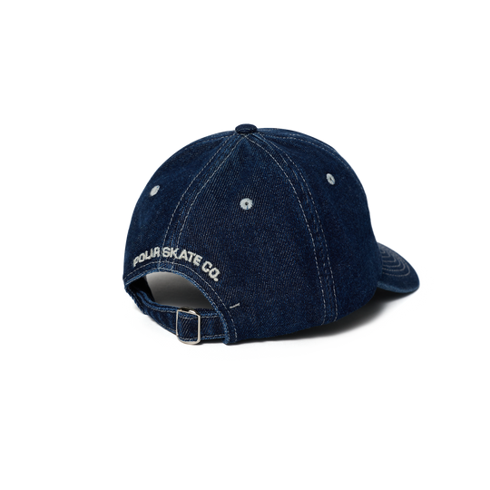 Blue denim cap with 'Four Skate Co' logo on a white background