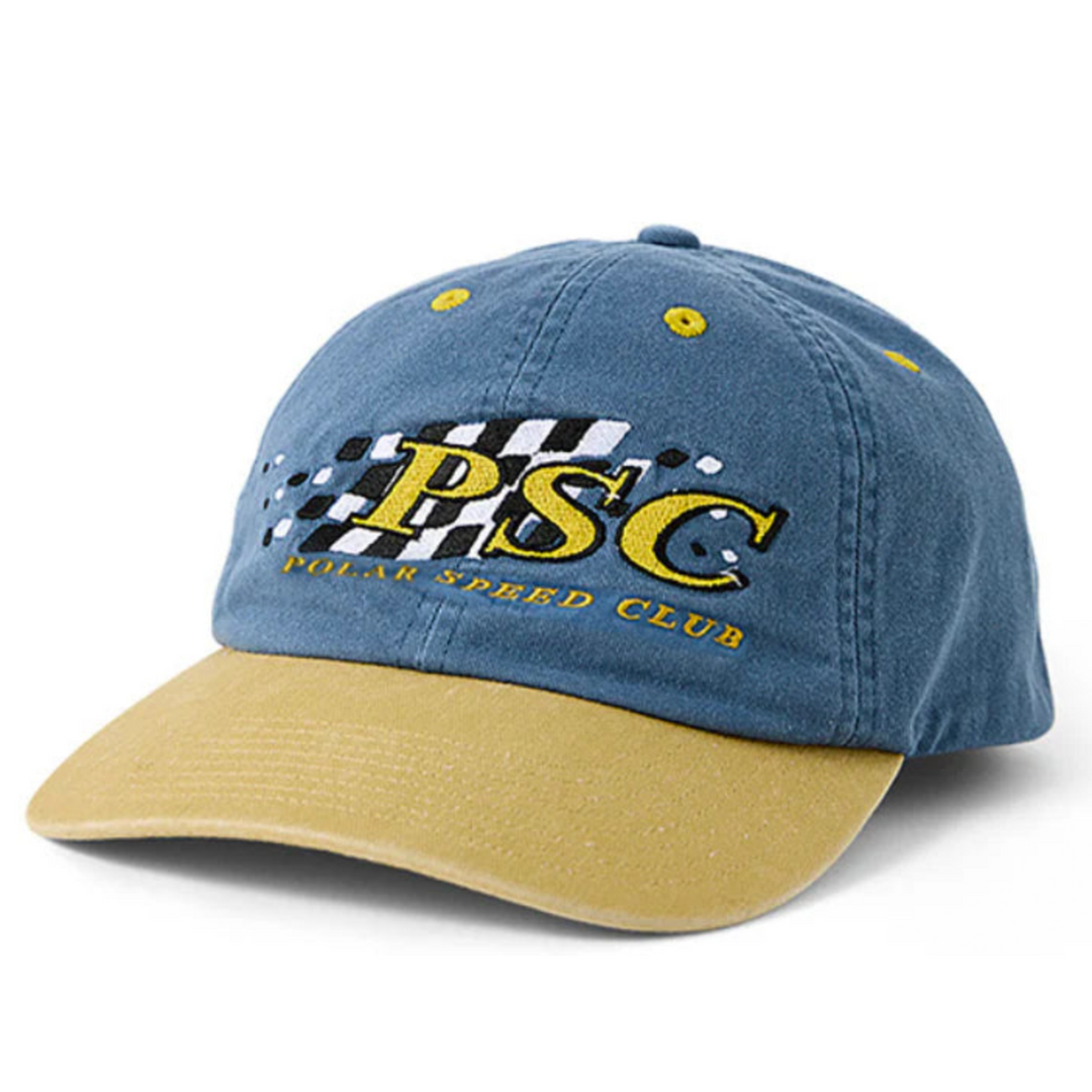 Blue and beige cap with 'Polar Speed Club' logo on a white background