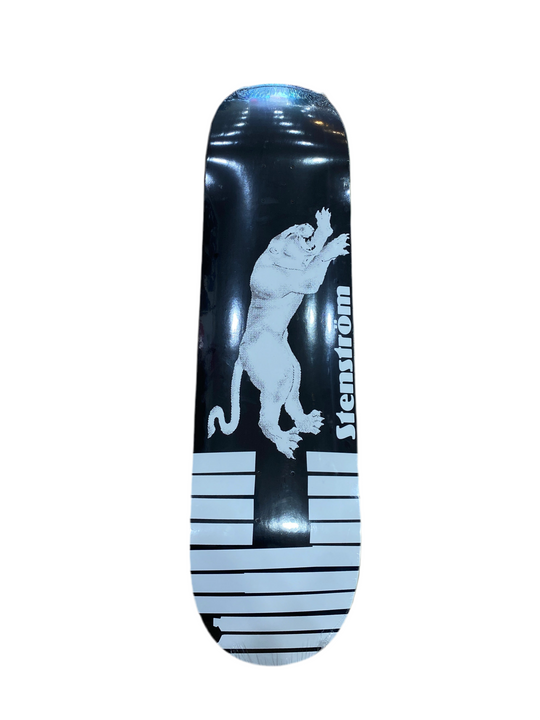 Skateboard deck with a white panther design and 'Stenstrom' branding 