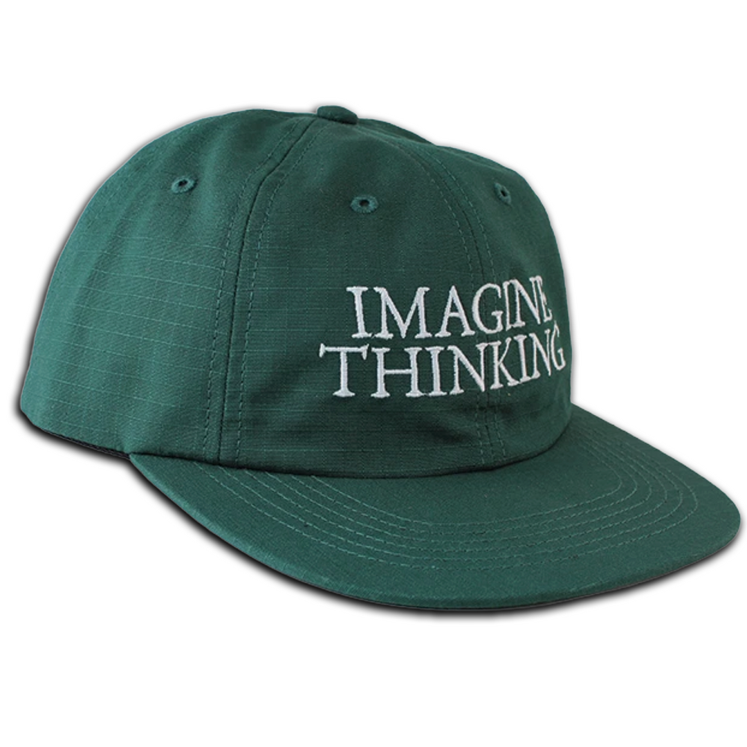Green cap with 'Imagine Thinking' text on a white background