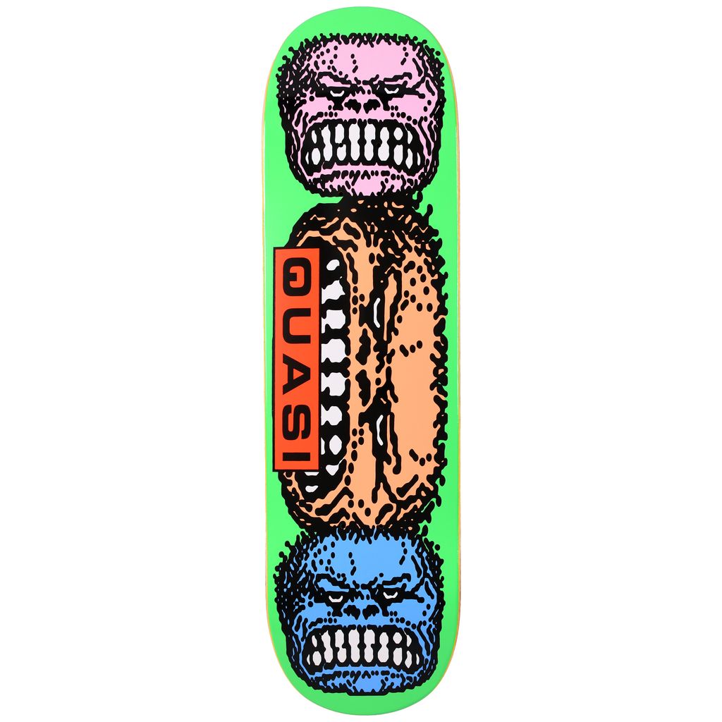 Skateboard deck with a colorful design of a creature and 'Quasi' branding on a green background
