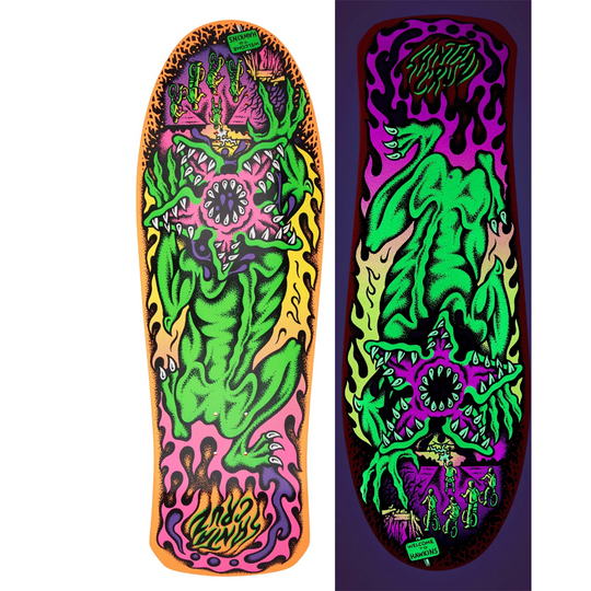 Colorful skateboard deck with a green creature design on a white background