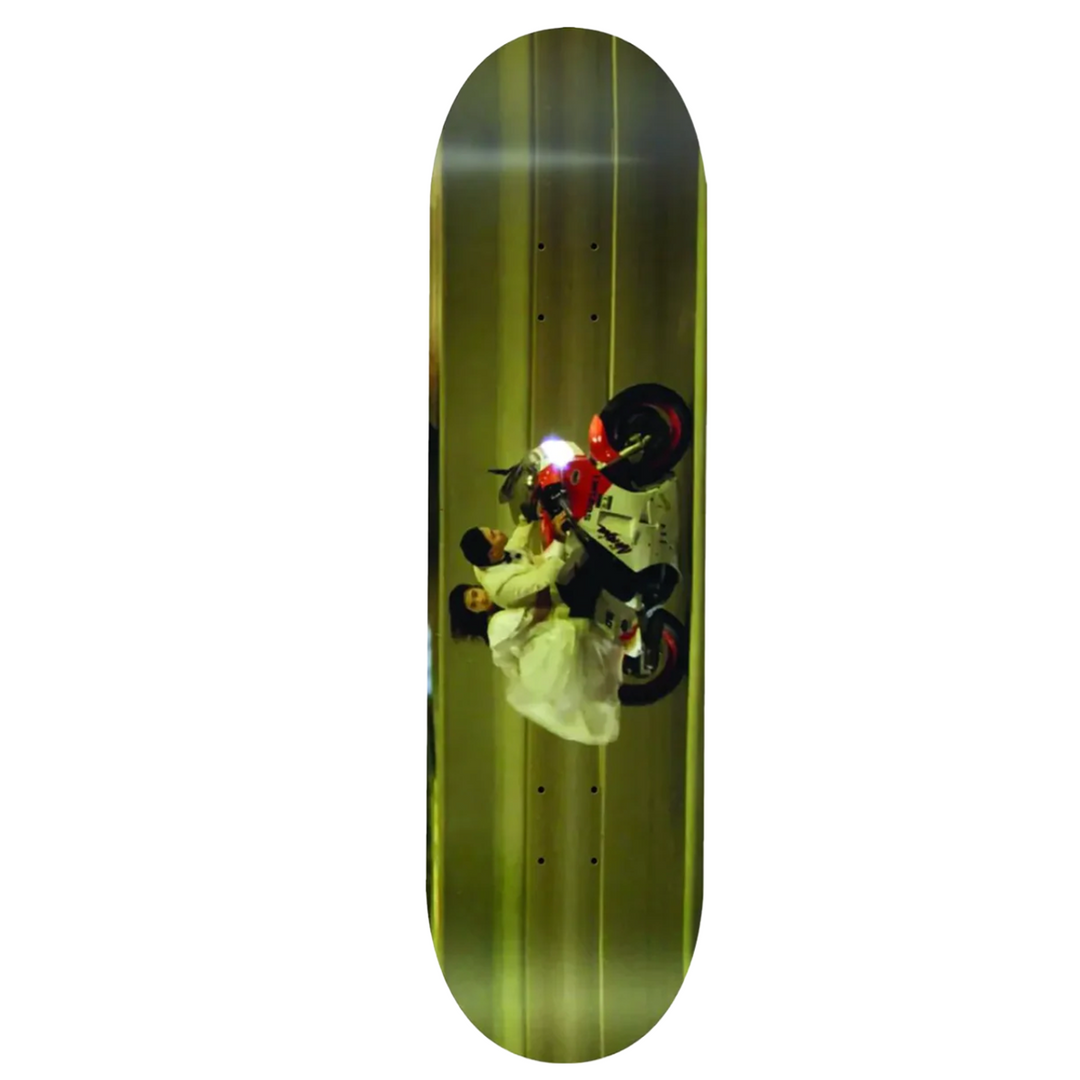 Skateboard deck with a graphic design of a couple on a white background