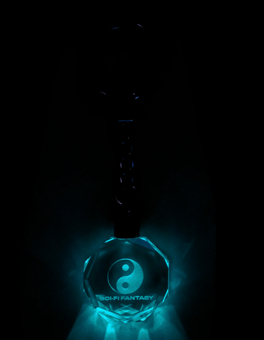 Crystal bottle with 'Sci-Fi Fantasy' logo on a black background