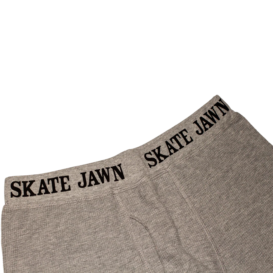 Gray boxer briefs with 'SKATE JAWN' branding 