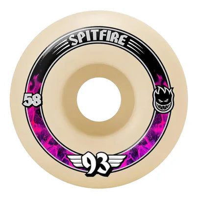 Beige skateboard wheel with pink and black accents 