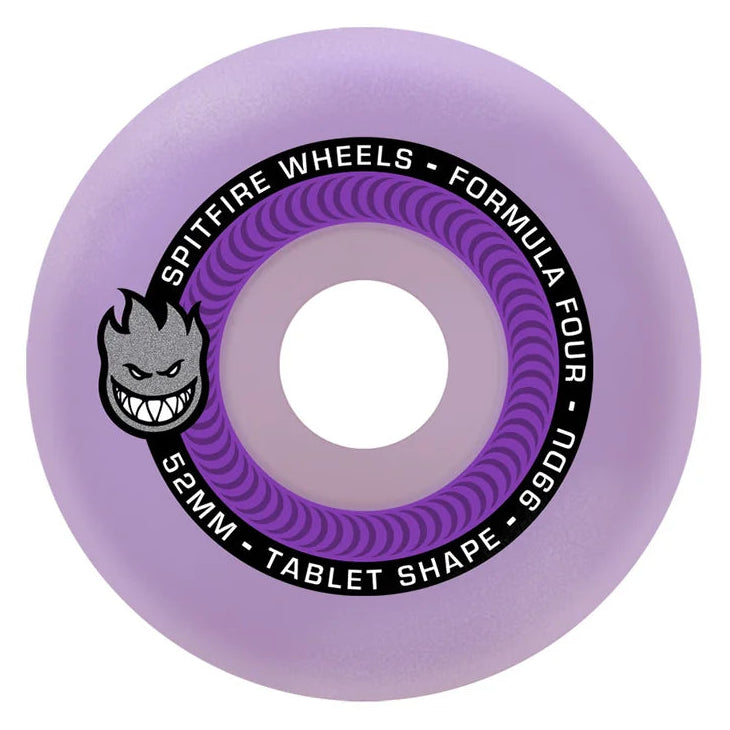 A single lavender purple skateboard wheel with a black and purple inner ring, featuring the gray and black Spitting Flames logo and text reading 'SPITFIRE WHEELS - FORMULA FOUR - 99BU - 32MM - TABLET SHAPE' on a plain white background.