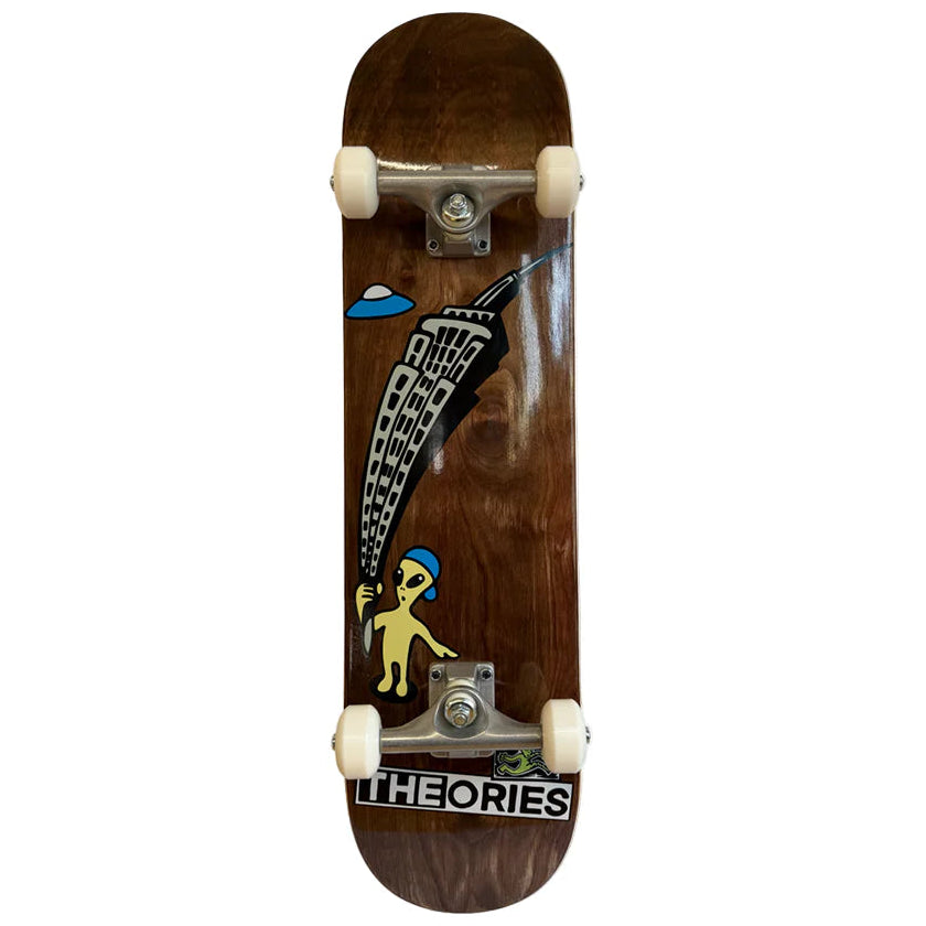 Skateboard with a wooden deck featuring graphics and 'Theories' branding on a white background