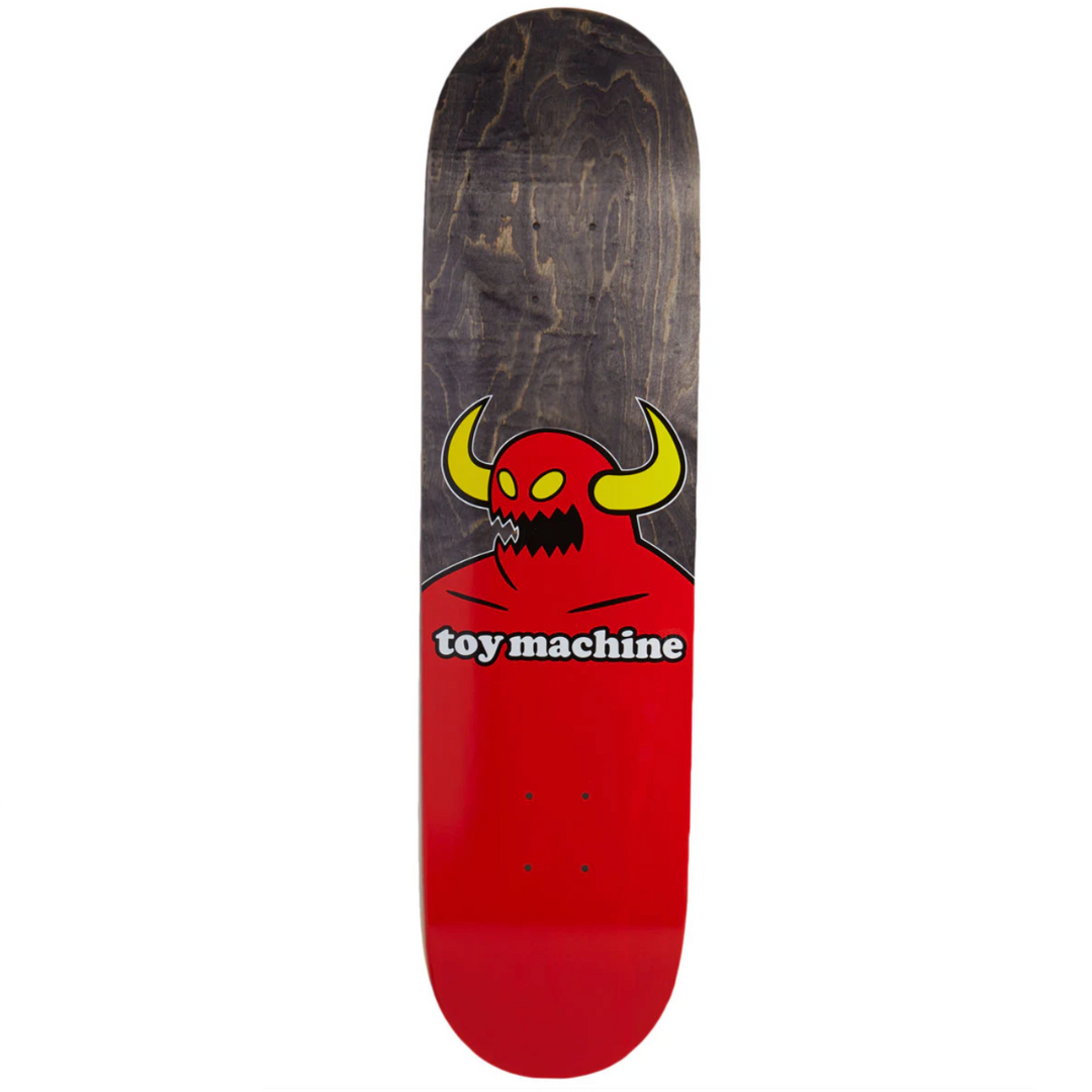 Skateboard deck with a red and black design and 'toy machine' branding on a white background
