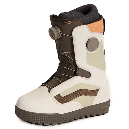 Snowboard boot with beige and brown design on a white background
