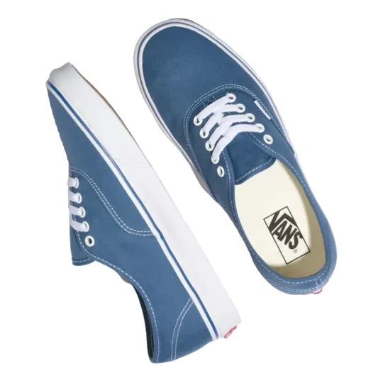 A pair of classic Vans platform sneakers in medium blue canvas with white laces, white rubber trim, and a thick white platform sole, shown from multiple angles on a light gray background.