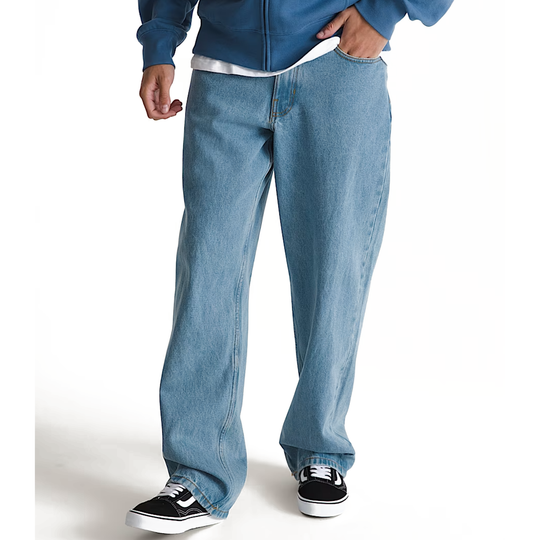 Person wearing blue jeans and a blue jacket