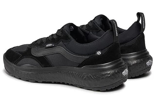 Black sneakers with thick soles on a white background