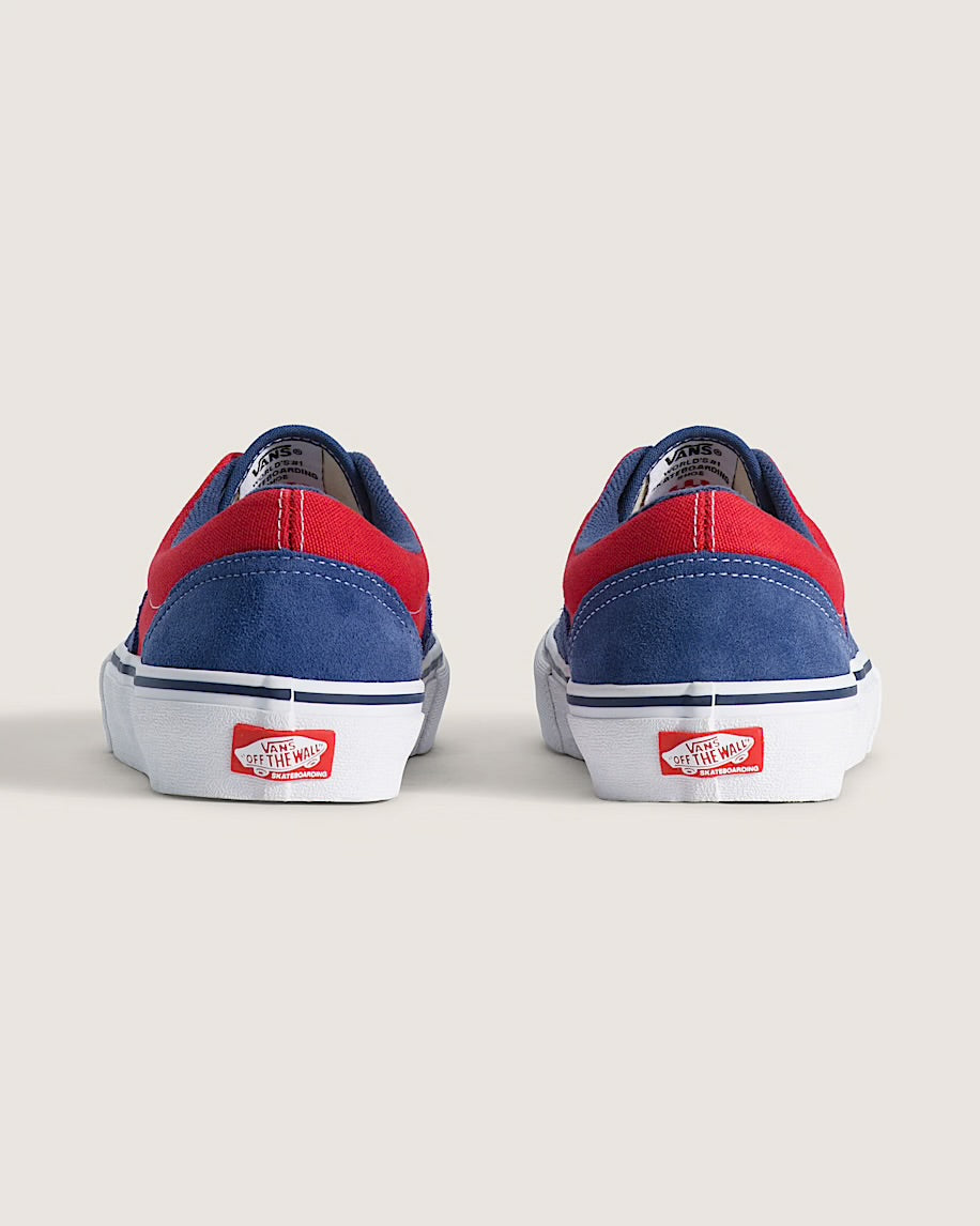 Blue and red sneakers with classic off the wall branding on white soles 