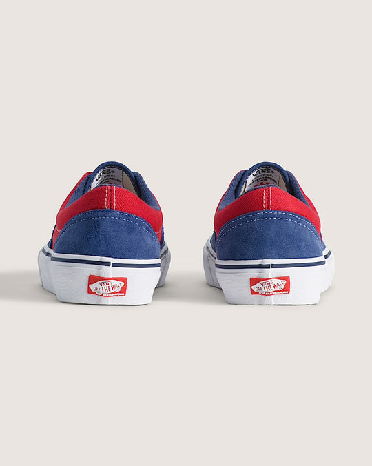 Blue and red sneakers with classic off the wall branding on white soles 