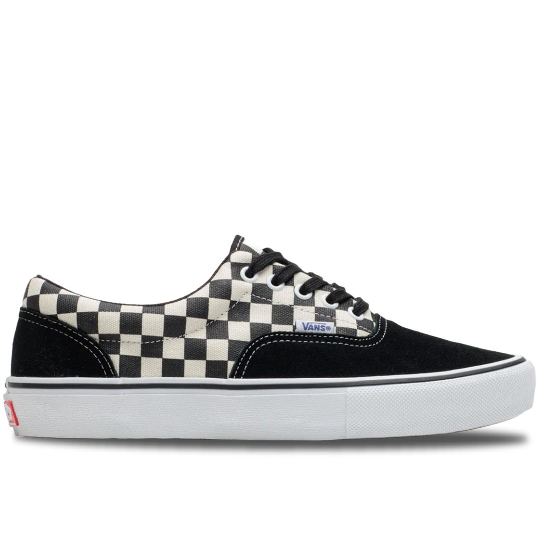 Black and white checkered sneaker with a visible brand logo on a white background
