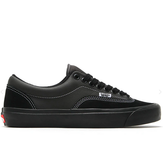 Black Vans sneaker on a white background