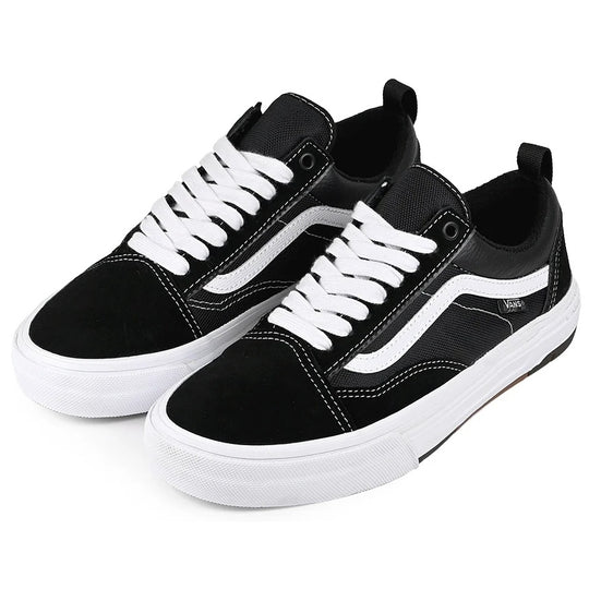 Black and white vans sneakers with a waffle cup sole