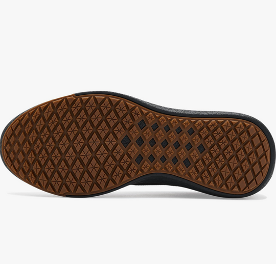 Brown shoe sole with diamond pattern on a white background