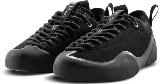 Black climbing shoes with brand logo on a white background