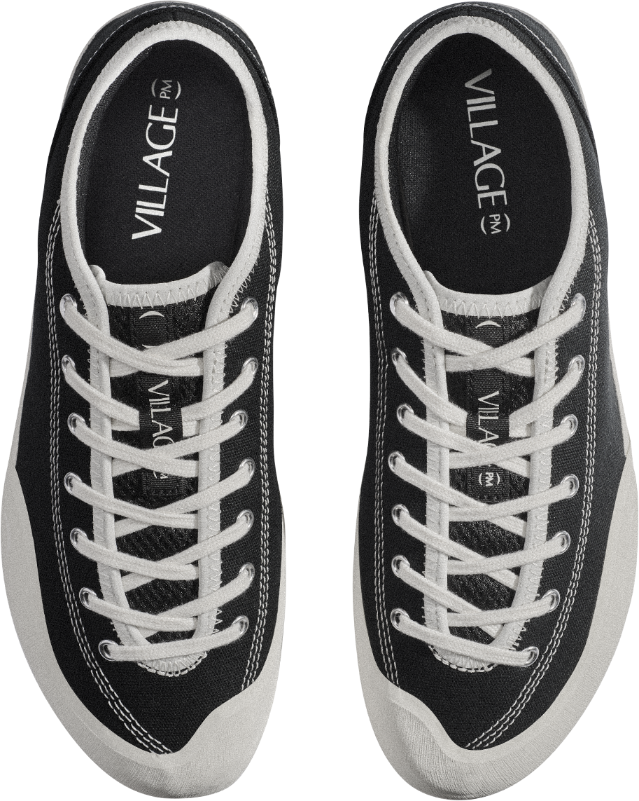 Black sneakers with white laces and &