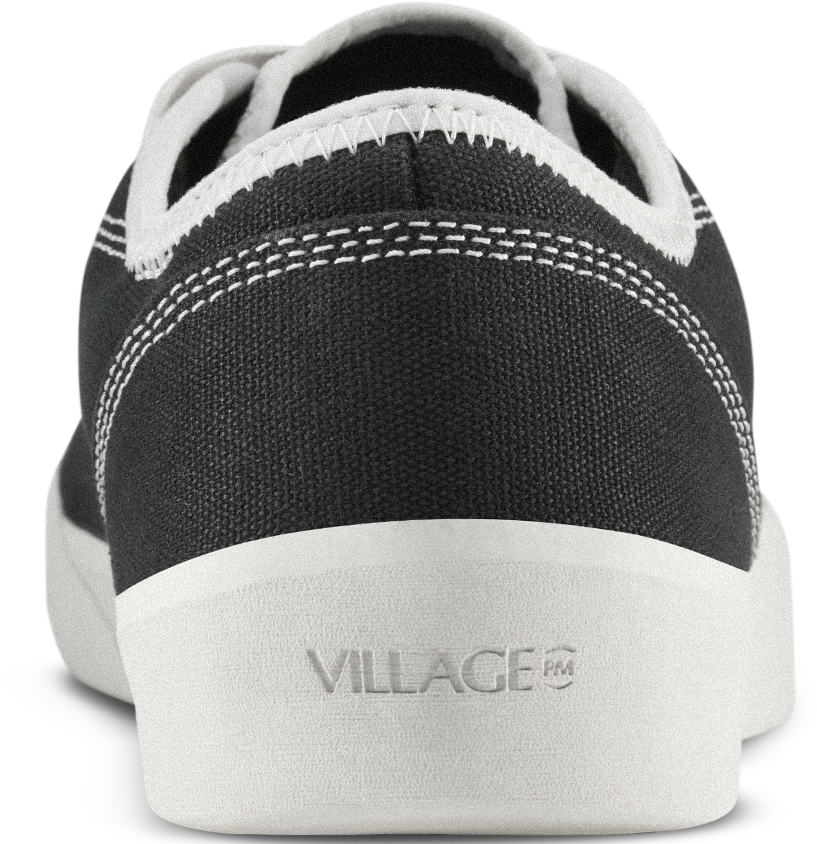 Black sneaker with white sole and &