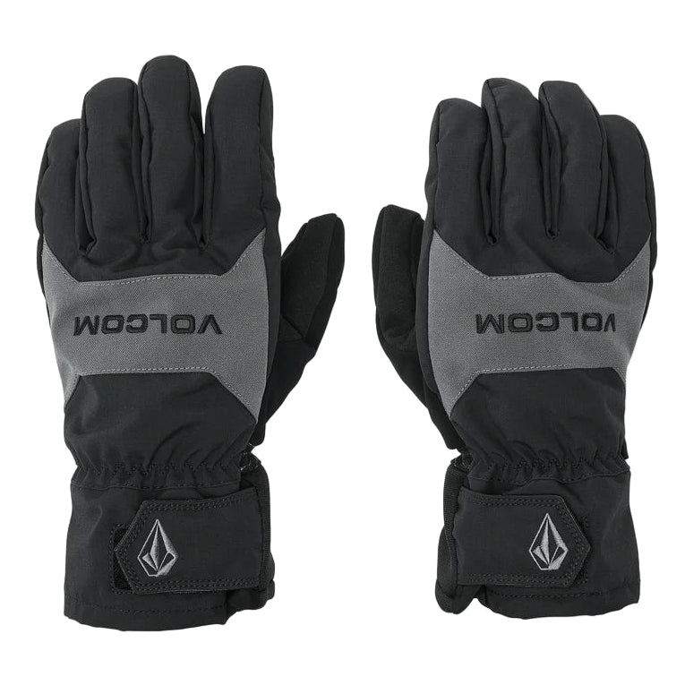 Pair of black and gray gloves with Volcom branding on a light gray background