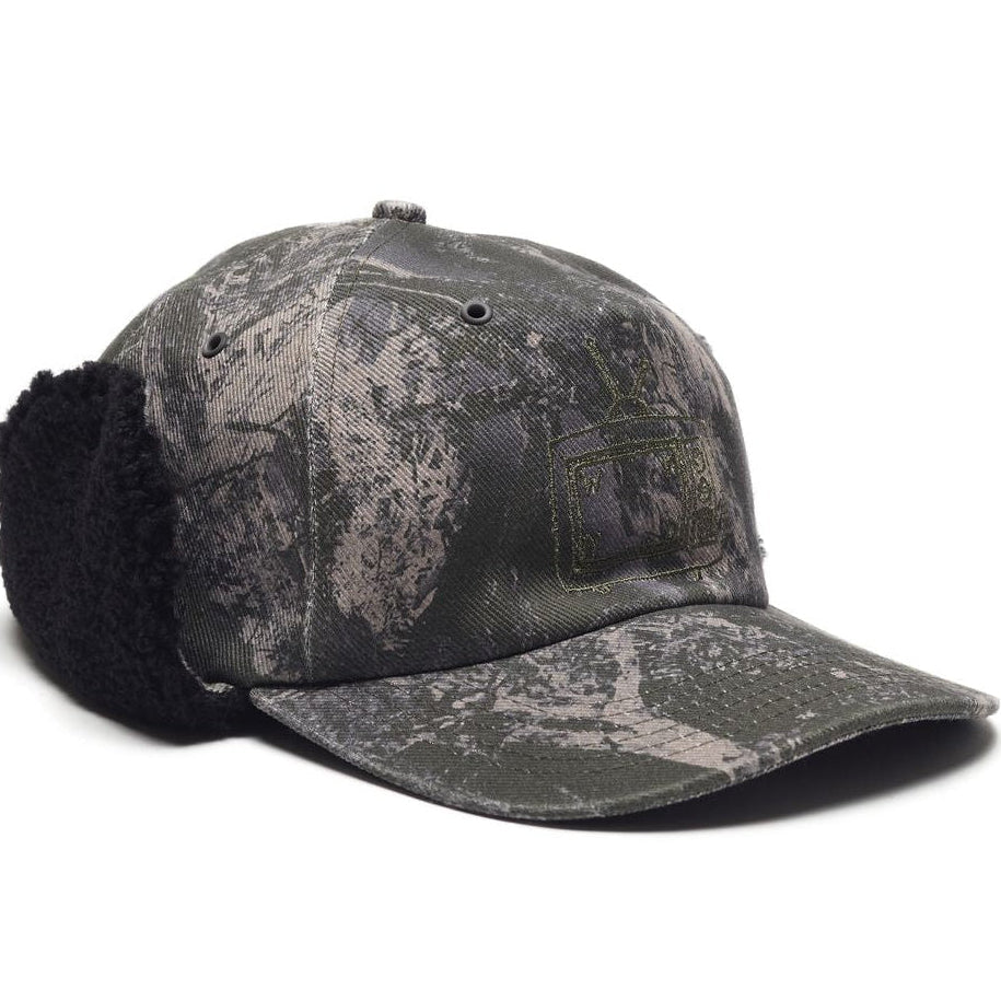 Camouflage baseball cap with ear flaps on a white background