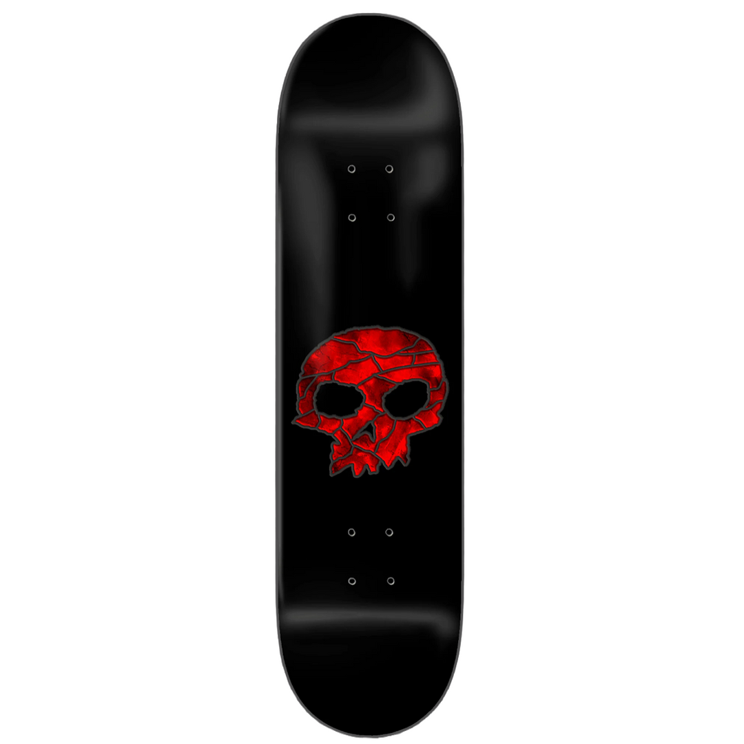 Black zero brand skateboard deck with a red stained glas skull design 
