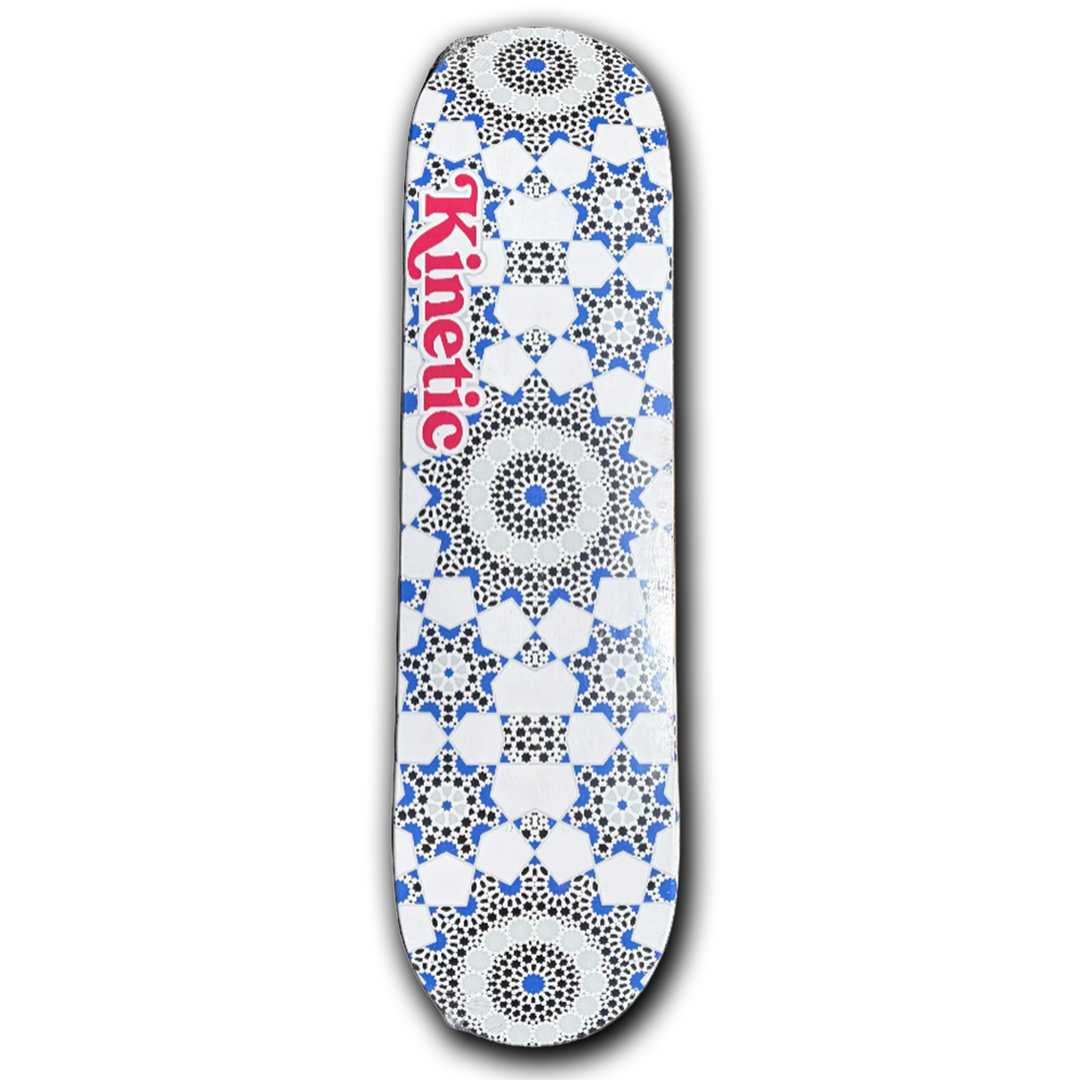 Skateboard deck with geometric pattern and 'Kinetic' branding on a white background