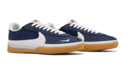 white swoosh navy suede