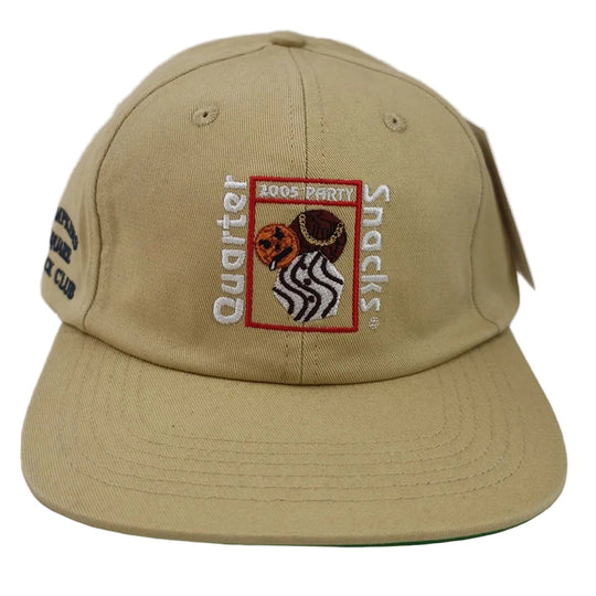 Beige cap with quartersnacks embroidered logo on a white background