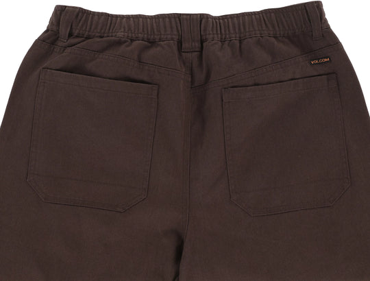 Brown pants with two front pockets on a white background